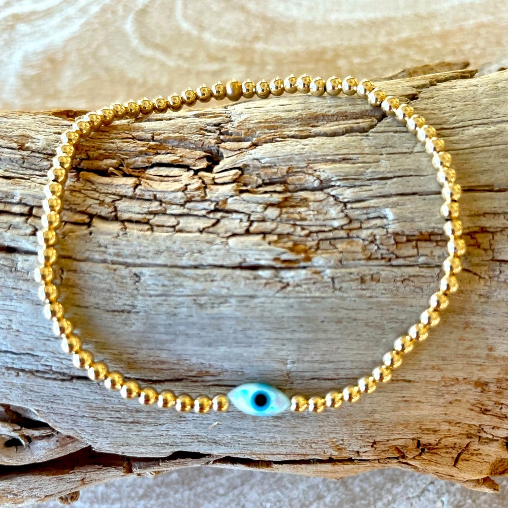 Handmade 14k gold filled stretch mother of pearl evil eye bracelet